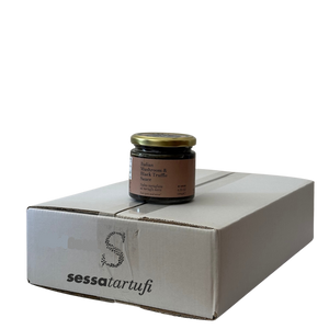 Jar of truffle product on a white box with 'sessatartufi' branding.