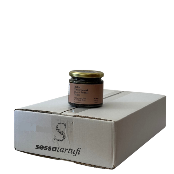 Jar of truffle product on a white box with 'sessatartufi' branding.